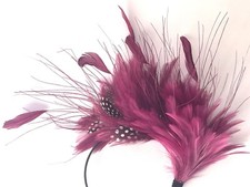 Plum feather fascinator hat