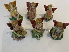 Fairy Figurines In Stone Resin. Flower Fairy Collection