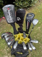 NICE SET OF MENS RIGHT HAND WILSON / ADAMS GOLF CLUBS IN A COBRA CART BAG.