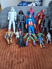 A Mixed Bundle of Action Figures Toys Various Sizes and Brands