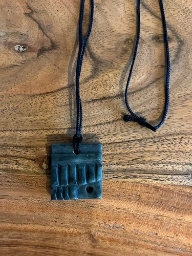 Hand carved pendant - hand,