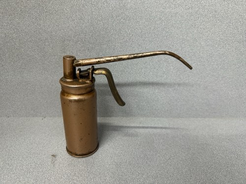 Vintage hand pump oil can - hand,