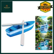 Charming Blue Wooden Rowboat