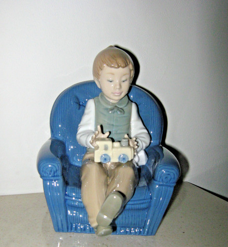 Nao lladro figurine just - by,