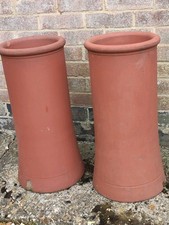 Two Red Terracotta Pair Of