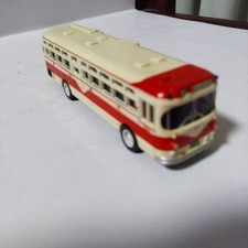 red and cream minibus