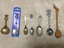 7 x COLLECTORS SPOONS (one