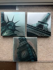 Landmark Prints x 3, shiny blue & silver colours on square boxed frames 20x20 cm