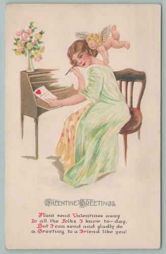 Valentine lady sits writing - sits,
