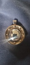 Unique Handcrafted Pendant in the style of an antique convex mirror.