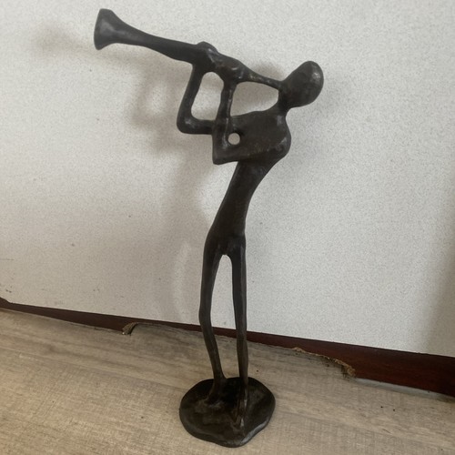 Abstract bronze jazz player