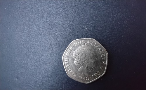 British fifty pence piece - a,
