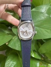 Quartz watch in Silver with similar design to Berneron Mirage, cartier crash