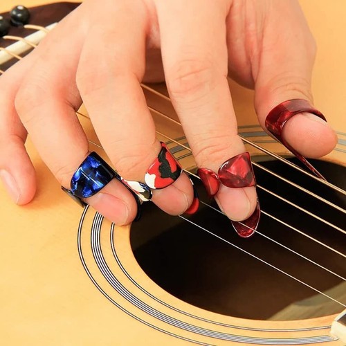 Finger and thumb pick - and,