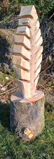 Chainsaw carved feather