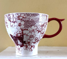 ANTHROPOLOGIE floral kitten