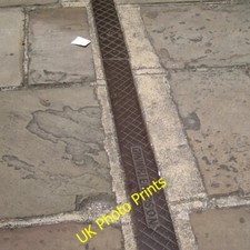 Photo 6x4 Cast iron channel cover by G.Napier & Son, Bugle Street, Southa c2014