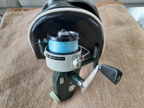 Vintage fishing reel cardinal - fishing,