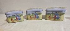 Three Small Tin Containers with Lids