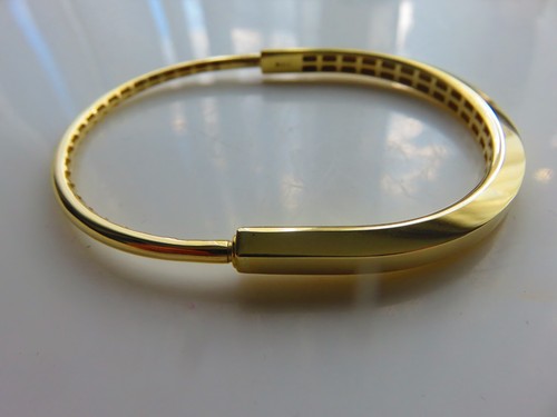 Gold hingeless bangle carat - 9,