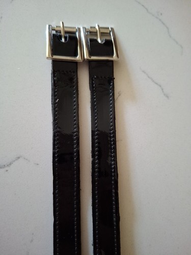 Petrie black patent spur - patent,