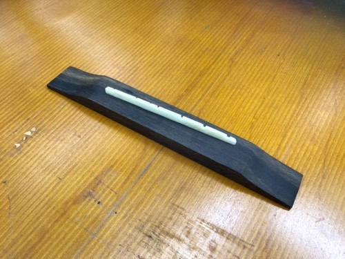 Righty ebony floating bridge - righty,