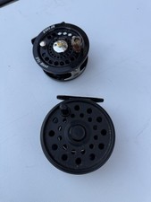 Two fixed spool reels fly - two,