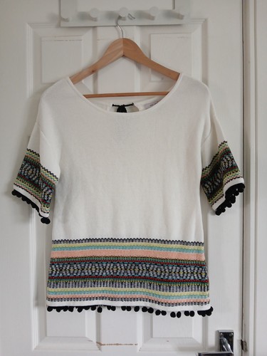 Per una round neck pom - una,