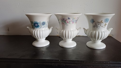 Three wedgewood small urn - three,