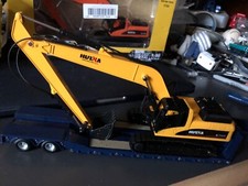 Long reach excavator - long,