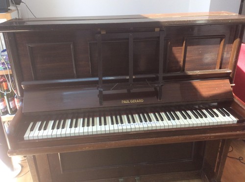 Upright piano used - named, as