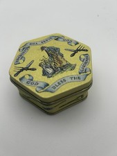 small metal tin with lid