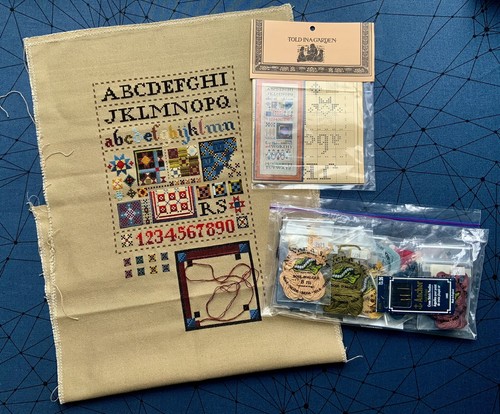 Amish quilt sampler cross - quilt,