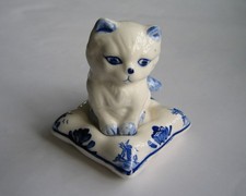 Delft Cat Sitting On Pillow