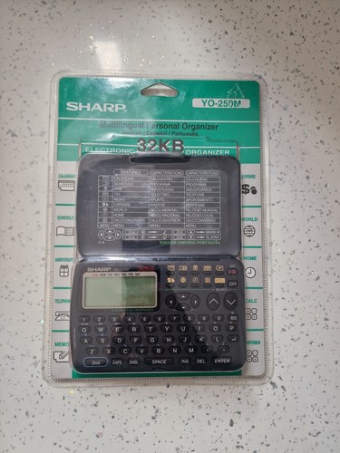 Sharp electronic personal - sharp,