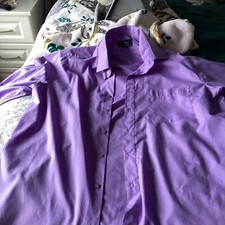 Brand-new purplelong sleeved shrt made by Rael . Brook it has a chest pocket