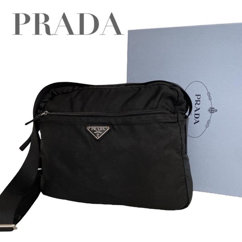 Prada triangle logo - prada,