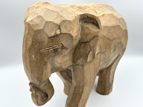 Hand carved wooden - hand, elephant