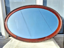 LARGE ANTIQUE MAHOGANY FRAMED OVAL BEVELLED EDGE WALL MIRROR
