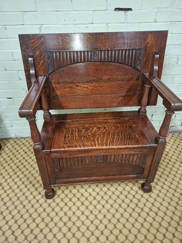 Carved oak monks bench with - monks,