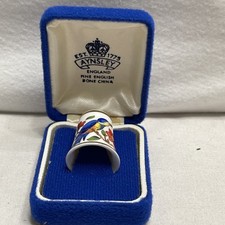 An Aynsley China thimble