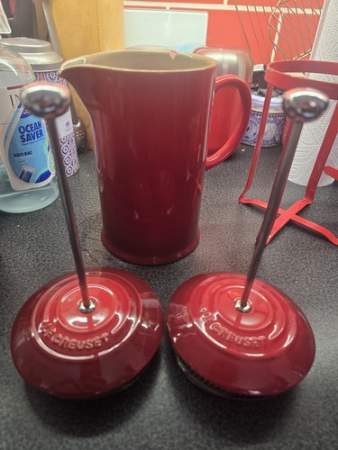 Two red creuset - two,