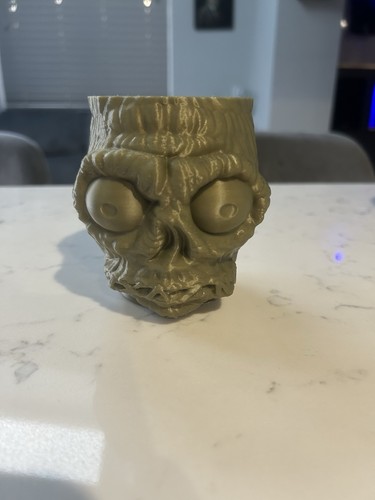Growing bob shrunken head - growing,