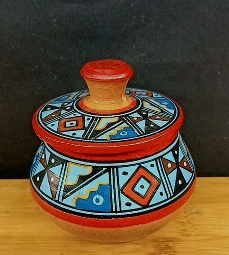 Aztec style coloured geometric - style,