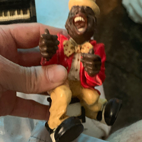 Resin figurine seated - resin, of