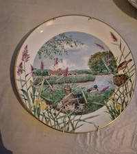 July Beside the River from