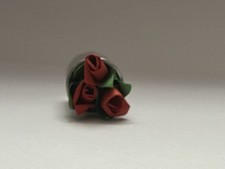 Handmade paper red roses in