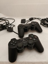 2x Official Dual Shock 2