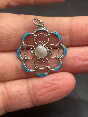 Silver and guilloche enamel
