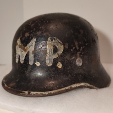 Original Second World War German "M40 Stahlhelm reissued for Allied M.P."
